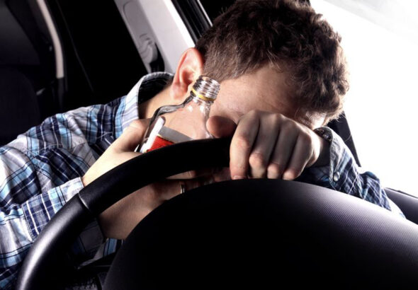 16604221 - drunk driver sleeping in the car